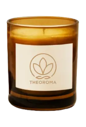 The Oroma mahogany teakwood candle in amber glass jar with premium label